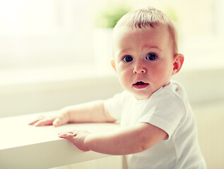 Image showing happy little baby boy or girl at home