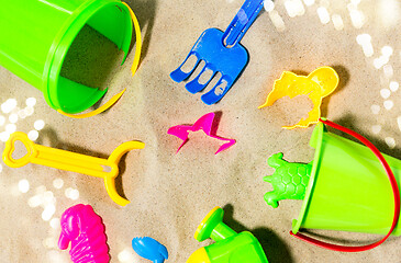 Image showing close up of sand toys kit on summer beach