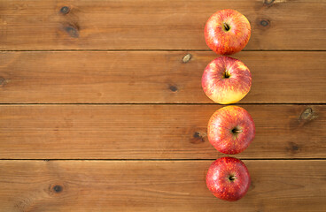 Image showing ripe red apples on wooden table