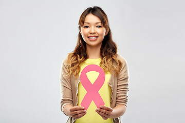 Image showing asian woman with breast cancer awareness ribbon