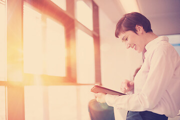 Image showing business woman on meeting  using tablet computer