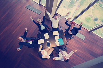 Image showing happy business people group on meeting at modern office