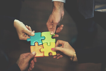 Image showing assembling jigsaw puzzle