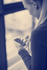 Image showing business woman using smart phone at office