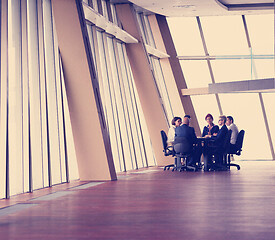 Image showing business people group on meeting at modern bright office