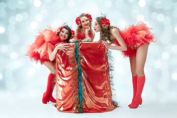 Image showing young beautiful dancers posing on studio background