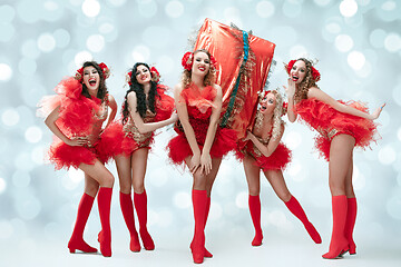 Image showing young beautiful dancers posing on studio background