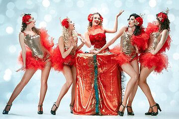 Image showing young beautiful dancers posing on studio background