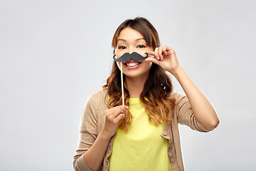 Image showing happy asian woman with big black mustache