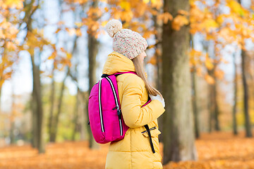 Image showing student girl with school bag at autumn park