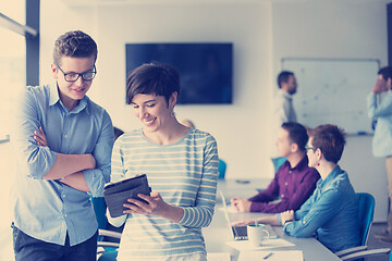 Image showing business People Working With Tablet in office