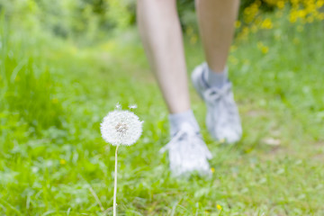 Image showing Feet of a running woman