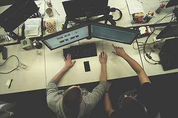 Image showing young programmers writing programming code top view