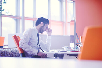 Image showing frustrated young business man at work