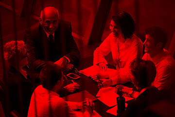 Image showing business people group on meeting at modern bright office