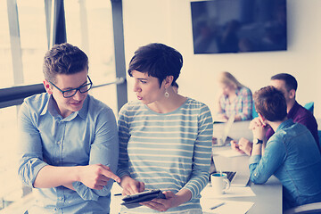 Image showing business People Working With Tablet in office