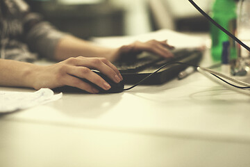 Image showing young programmer writing programming code