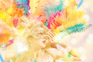 Image showing Beautiful young woman in carnival mask