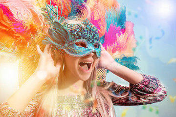 Image showing Beautiful young woman in carnival mask