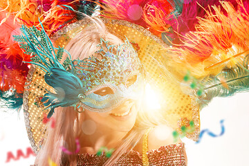 Image showing Beautiful young woman in carnival mask