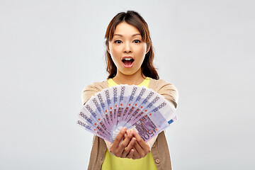 Image showing asian woman with hundreds of euro money