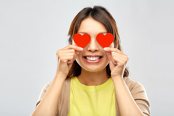 Image showing happy woman with eyes of hearts