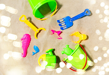 Image showing close up of sand toys kit on summer beach