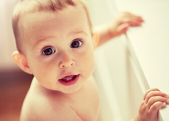 Image showing happy little baby boy or girl at home