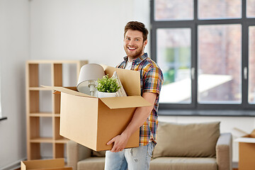 Image showing happy man with box moving to new home