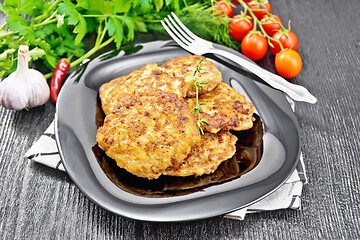 Image showing Fritters meat in plate on wooden board