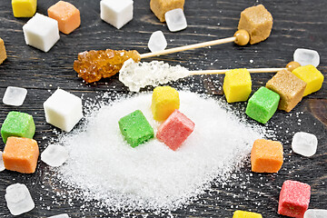 Image showing Sugar of different colors and shapes on board