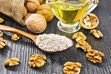 Image showing Flour walnut in spoon on board