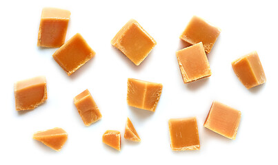 Image showing caramel pieces on white background