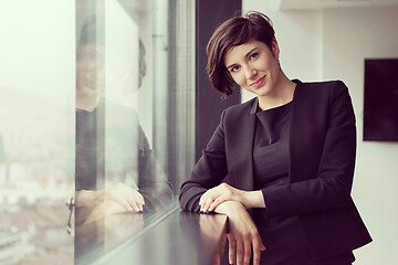 Image showing Portrait of successful Businesswoman by the window