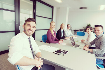 Image showing young business people group on team meeting at modern office