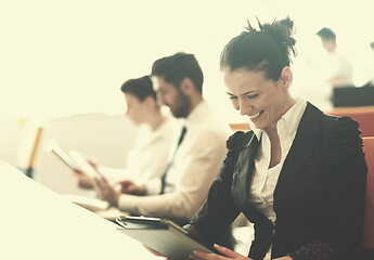 Image showing business woman on meeting  using tablet