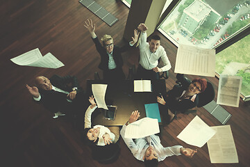 Image showing happy business people group on meeting at modern office