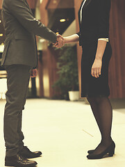 Image showing businesswoman and businessman handshake