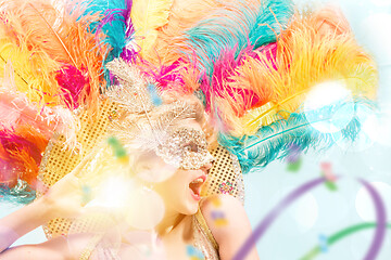 Image showing Beautiful young woman in carnival mask