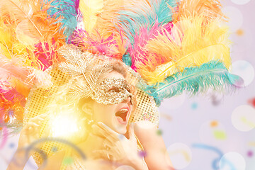 Image showing Beautiful young woman in carnival mask