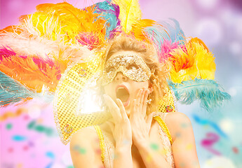 Image showing Beautiful young woman in carnival mask