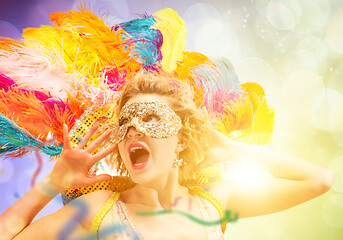 Image showing Beautiful young woman in carnival mask