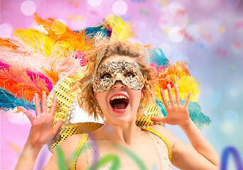 Image showing Beautiful young woman in carnival mask