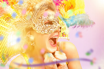 Image showing Beautiful young woman in carnival mask