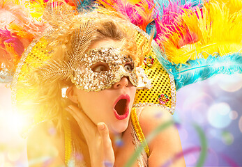 Image showing Beautiful young woman in carnival mask