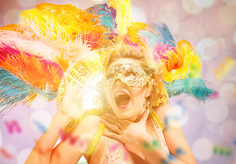 Image showing Beautiful young woman in carnival mask