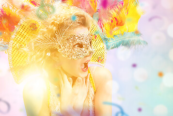 Image showing Beautiful young woman in carnival mask