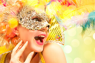 Image showing Beautiful young woman in carnival mask