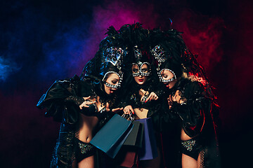 Image showing young beautiful dancers posing on studio background