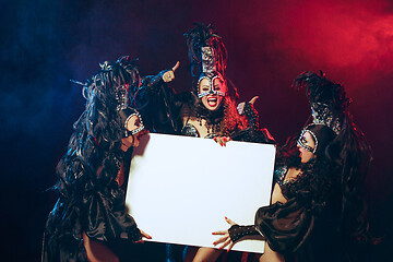 Image showing young beautiful dancers posing on studio background